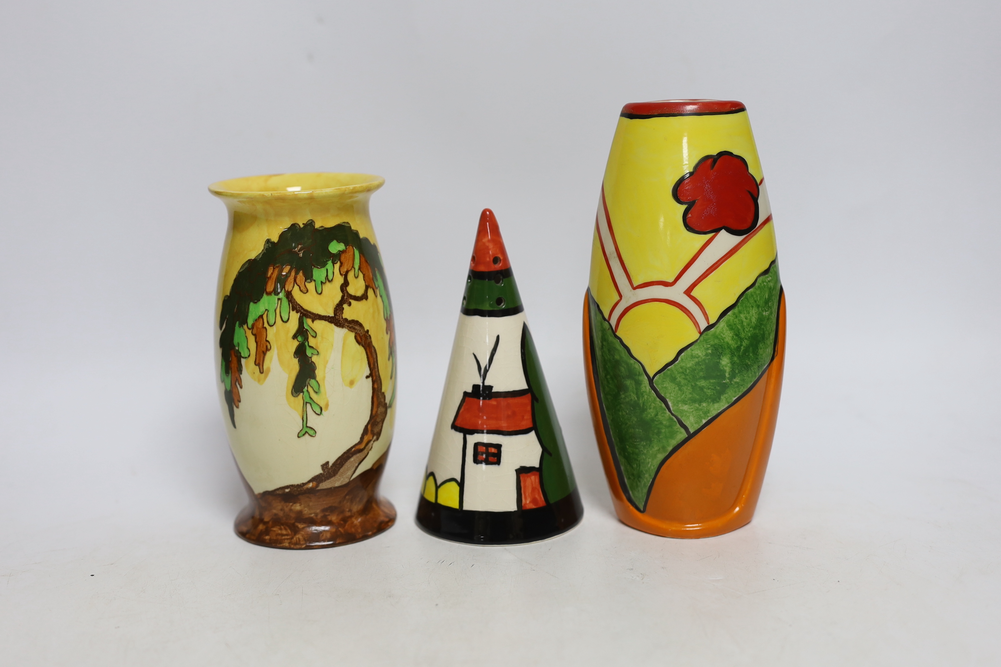 A Bernadette Eve “House” hand painted conical sugar sifter, a limited edition Heron Cross “Sunny Meadow” vase painted by Denise Steele 30/100 and a Burslem “Memory Lane” vase, all in Clarice Cliff style, tallest 18.5cm
